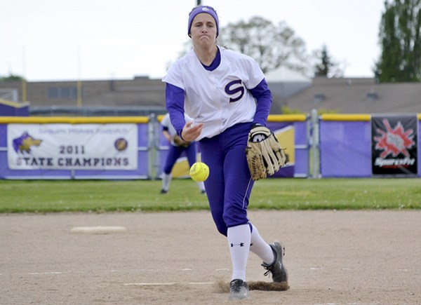 Sequim’s Melissa Lewis hurls a pitch as the Wolves take on North Mason on May 2. Lewis struck out one batter and earned the win.