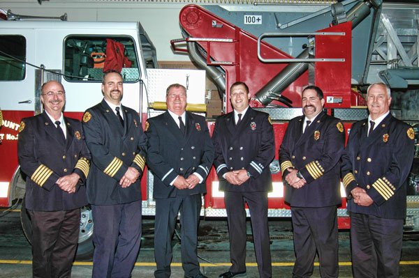 Fire district promotes two and adds recruits