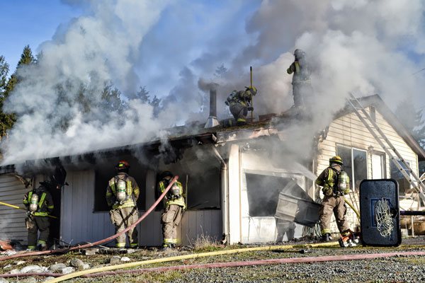 Fire burns home near Old Olympic Highway