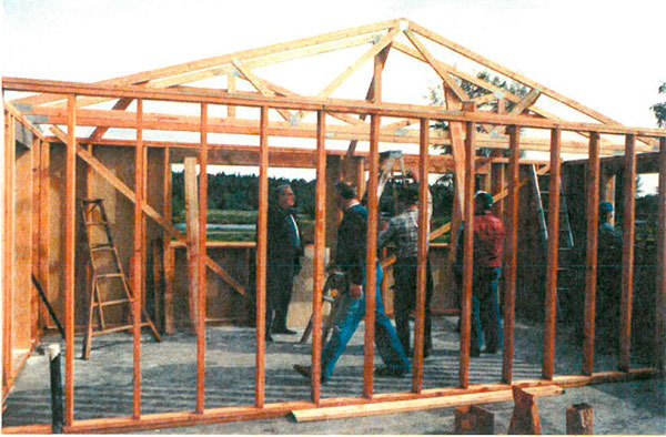 Lions club members look over the initial construction of Guy Cole Center.