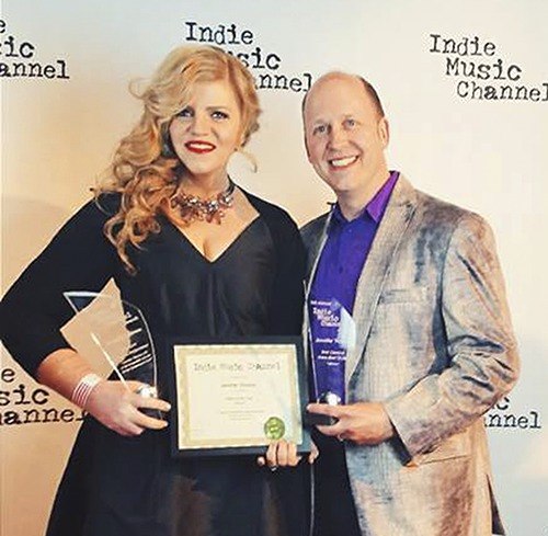 Jennifer Thomas stands with music engineer Brian Vibberts at the Indie Music Channel Awards. Vibberts worked on Thomas’ “Winter Symphony” album