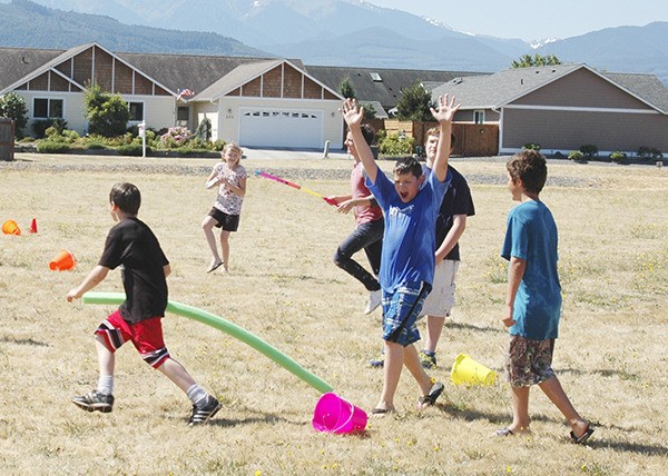 Fifth- and sixth-graders let loose in a water fight on their last day of First Baptist Church Sequim’s vacation bible school.