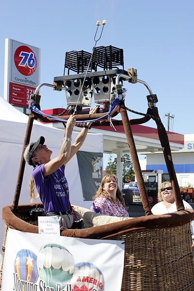 Captain Crystal Stout readies a marshmallow during the Sequim Irrigation Festival Street Fair in 2014 to promote the Olympic Peninsula Air Affaire's balloon rides. This year