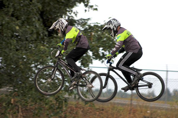 BikeMaster BMX team members Riley Zappen of Port Orchard and Preston Stevens of Milton compete in a State Championship Race in Port Angeles on July 10. Despite a delay of out-of-town riders thanks to a closure of the Hood Canal bridge