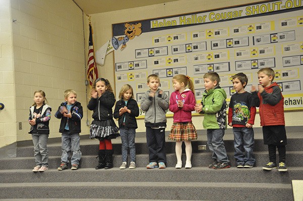 Helen Haller Elementary School kindergartners (from left) Harper Moore