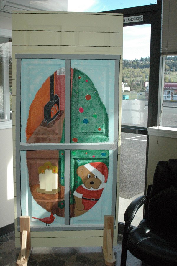 A Christmas-themed door on display at Castell Insurance in Sequim is one of 34 doors painted by local artists as part of Habitat for Humanity of Clallam County’s 25th anniversary celebration and upcoming annual event “A Taste of the Peninsula.”