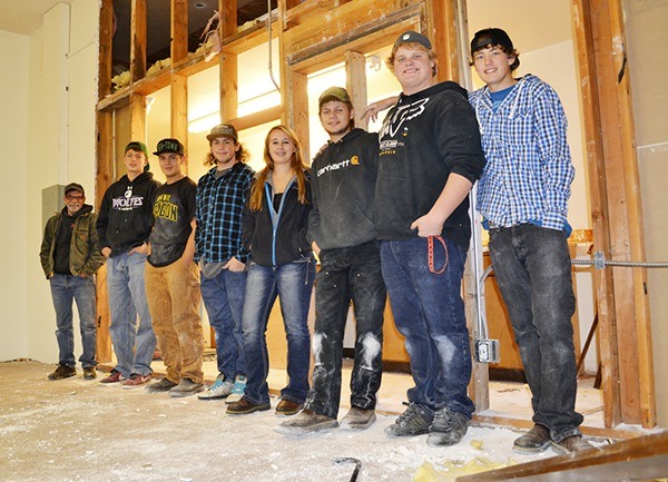 Sequim students with the North Olympic Peninsula Skills Center stay busy five days a week in the Guy Cole Mini-convention Center demoing and remodeling space. Students include