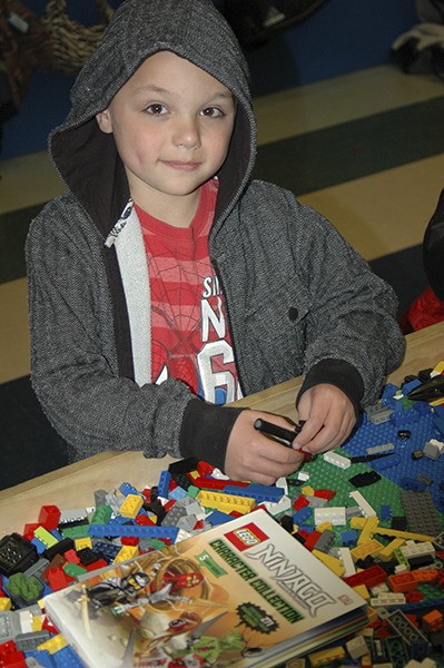 Seven-year-old Drew Zeppa’s favorite activity at the Boys & Girls Club is building things at the Lego table.