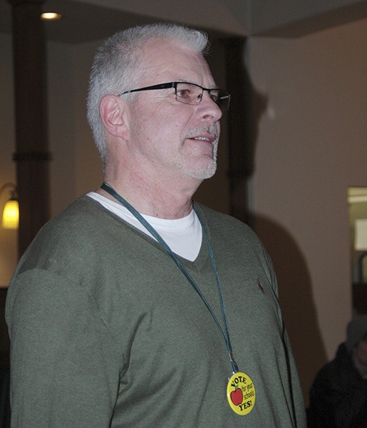 Sequim schools superintendent Gary Neal talks to school bond proposal advocates on Feb. 9