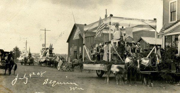 An Independence Day parade moves through Sequim in 1908