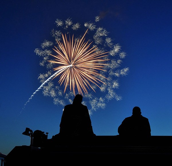 Firefighters from Clallam County Fire District 2 standby in Port Angeles during a Fourth of July fireworks display.