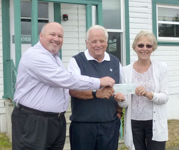 Dan Wilder and the National Automobile Dealers Charitable Foundation recently presented a $2