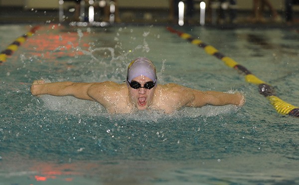 Sequim's Eric Prosser swims the butterfly leg of the 200 medley as his Wolves take on North Kitsap in January. He's headed to the state final for the third time in as many seasons on Feb. 20.