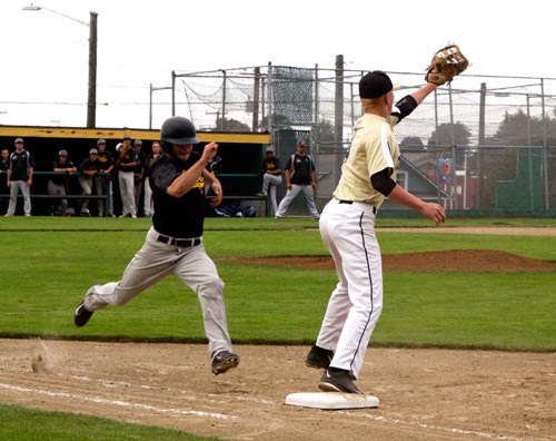 Crosscutter Gavin Velarde hustles to first base to try to beat the throw to the Centralia first baseman Broe Selstrom.