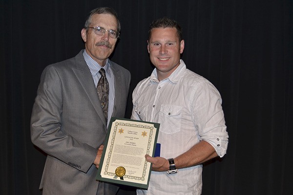 The Clallam County Sheriff’s Office honors corrections Deputy Eric Morris with the the 2014 Sheriff’s Office Life Saving Award for saving the life of an inmate on Sept. 3