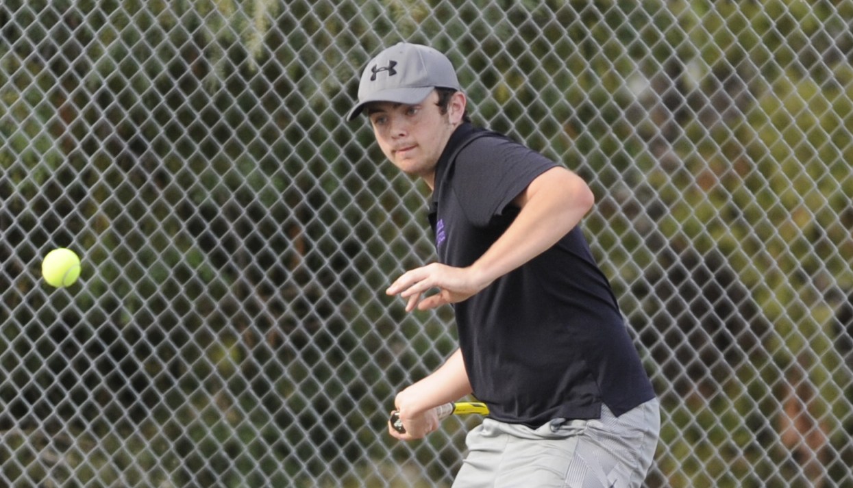 Stephen Prorok returns a shot as Sequim takes on Kingston on Sept. 16. Sequim Gazette photo by Michael Dashiell