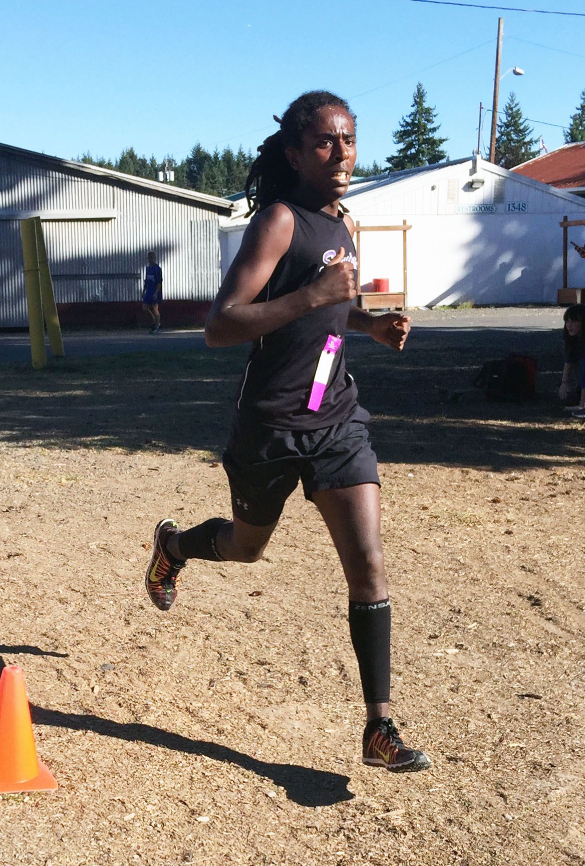 Ash Francis races to a first place finish in Sequim's first Olympic League meet on Oct. 21. Photo courtesy of Mike Cobb