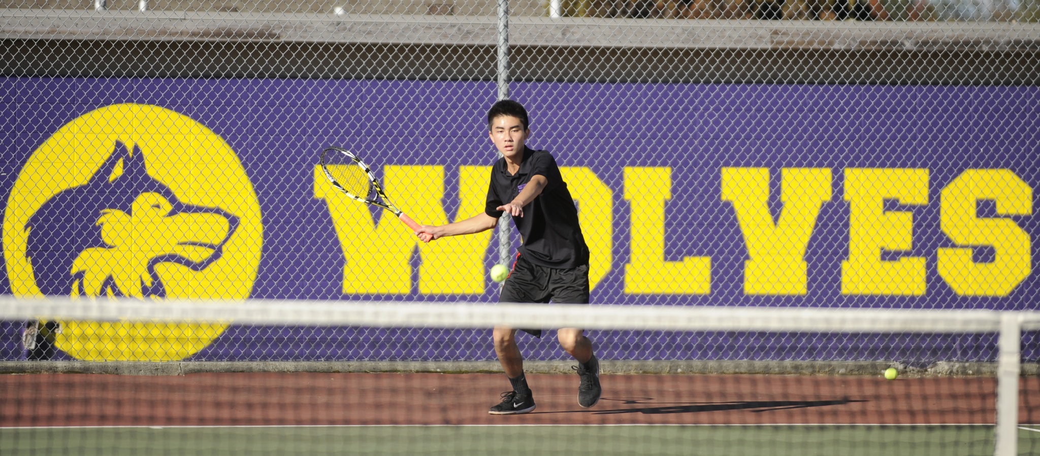 Raymond Lam returns a shot as Sequim takes on Klahowya at home on Sept. 21. Sequim Gazette photo by Michael Dashiell