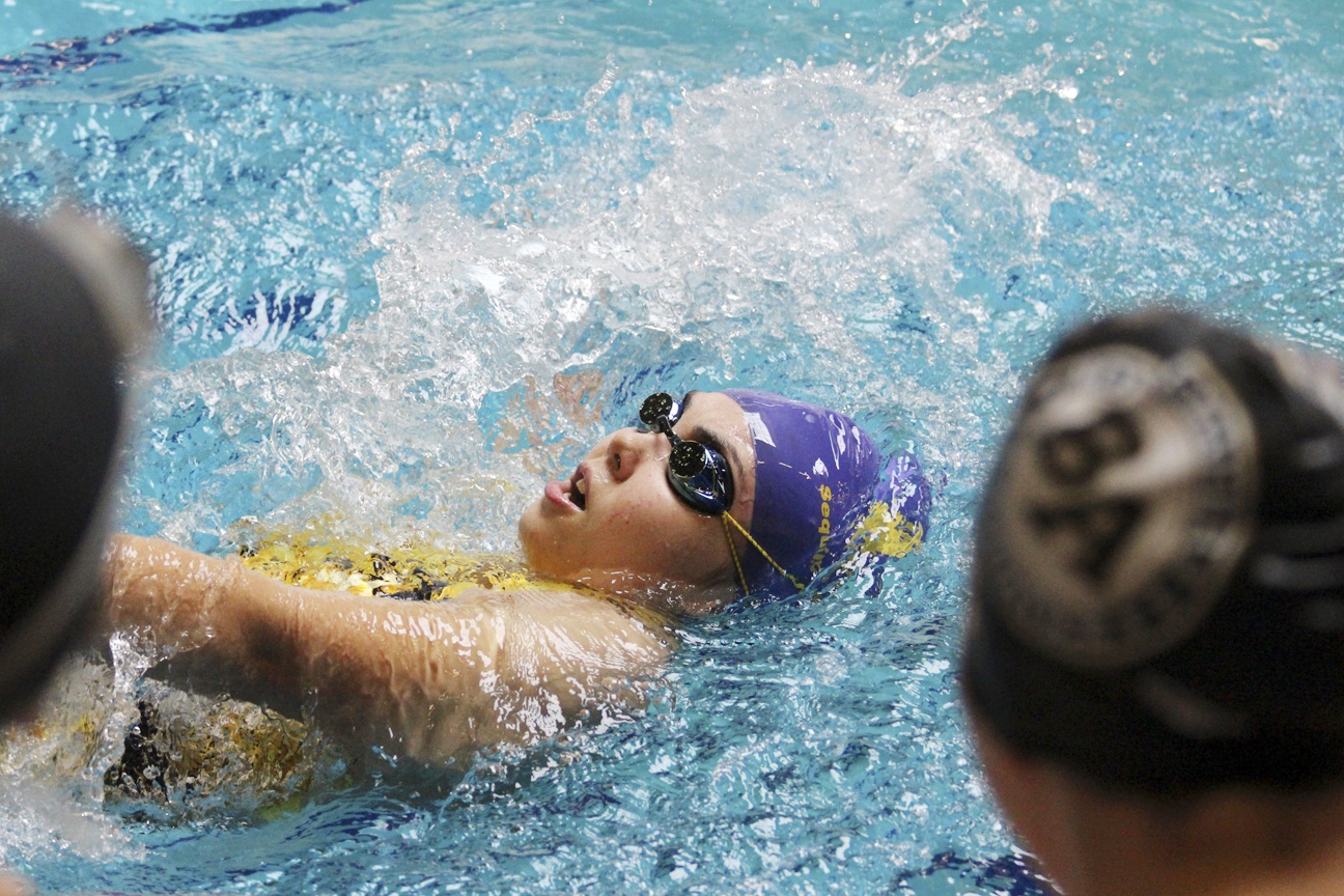 Sequim’s Sydnee Linnane swims the backstroke at the Swimviational on Sept. 24 in Bremerton. So far this season