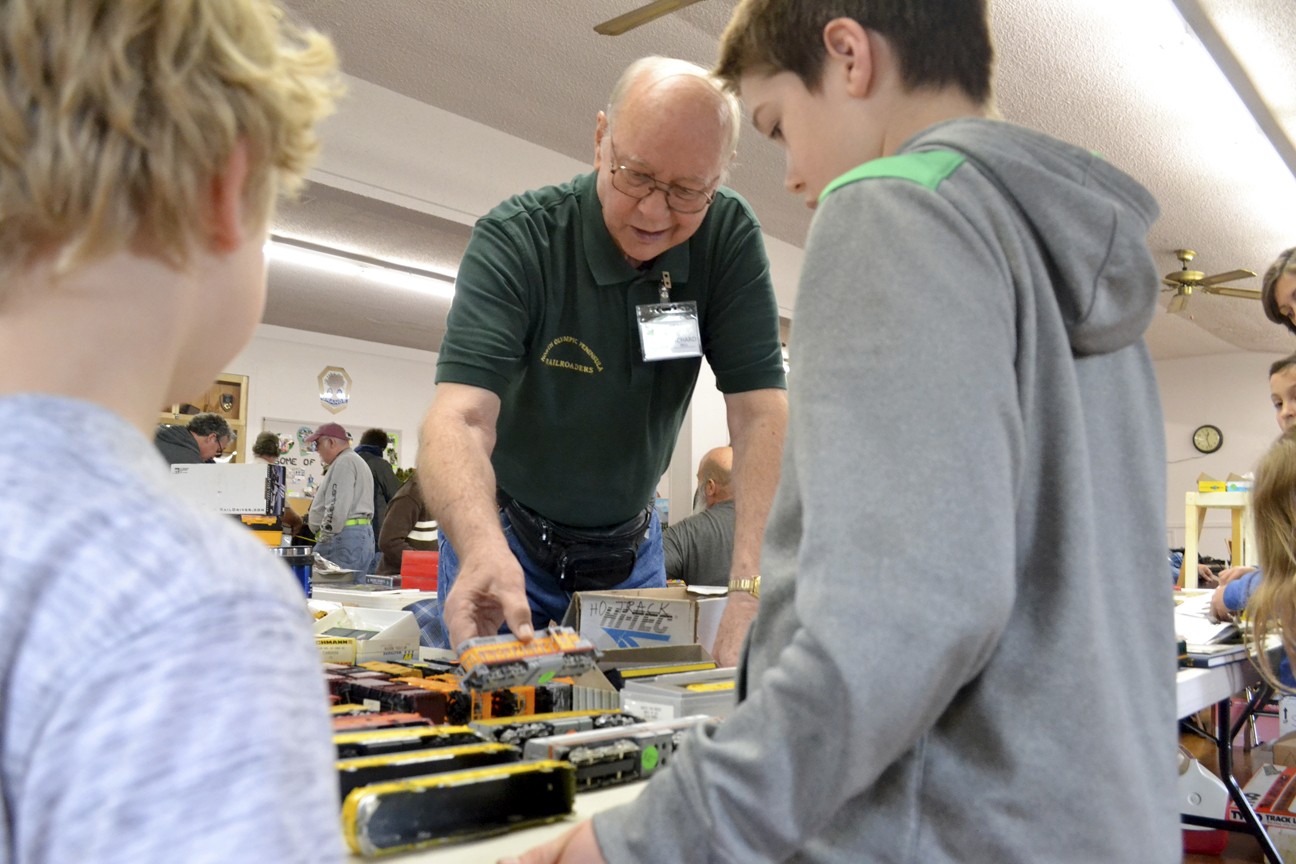 Richard Bell with the North Olympic Peninsula Railroaders speaks with the Clemens brothers Ben