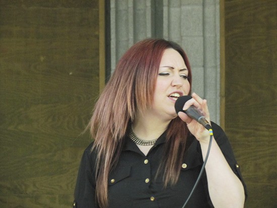 Natalie Wilson sings her way to a win in the City of Sequim’s fourth annual Karaoke Idol on July 28.