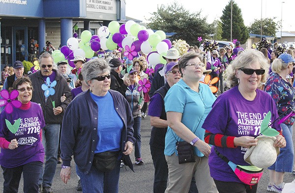 Nearly every participant held a “Promise Garden” flower of a different color to show their own connection to Alzheimer’s disease. Blue represented someone with Alzheimer’s or dementia; purple was for someone who has lost a loved one to the disease; yellow was for those currently supporting or caring for someone with Alzheimer’s; and orange was for everyone who supports an end to Alzheimer’s.