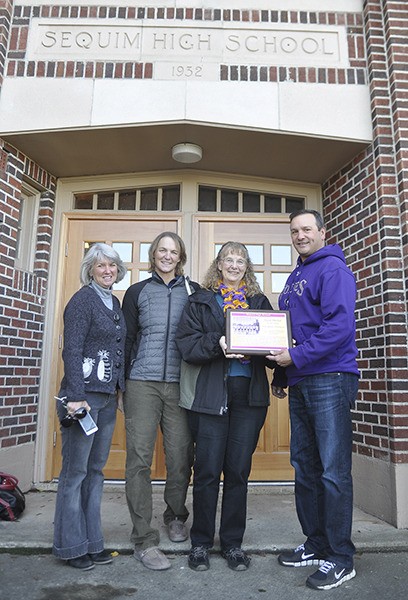 With a plaque honoring Joe Rantz