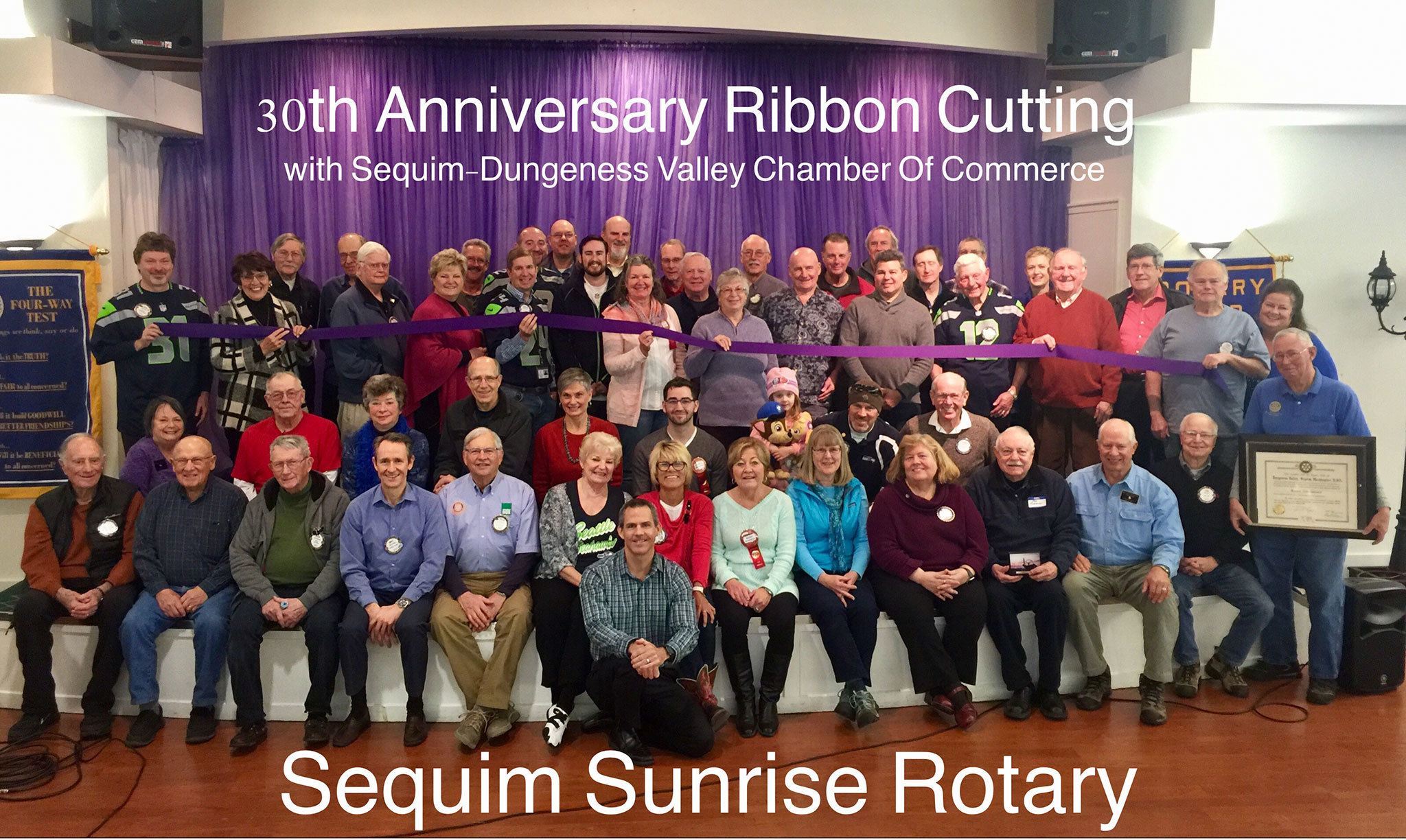 Sequim Sunrose Rotary members and Sequim Ambassadors with the Sequim-Dungeness Valley Chamber of Commerce celebrate the club’s 30th anniversary with a ribbon cutting on Jan. 13. Photos courtesy of Sequim Sunrise Rotary