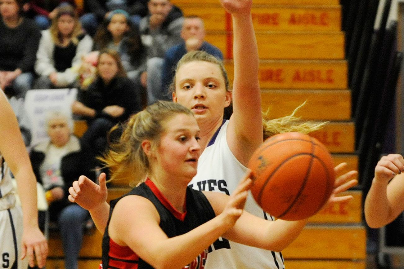 Girls basketball: Wolves win tiebreaker, move on to districts