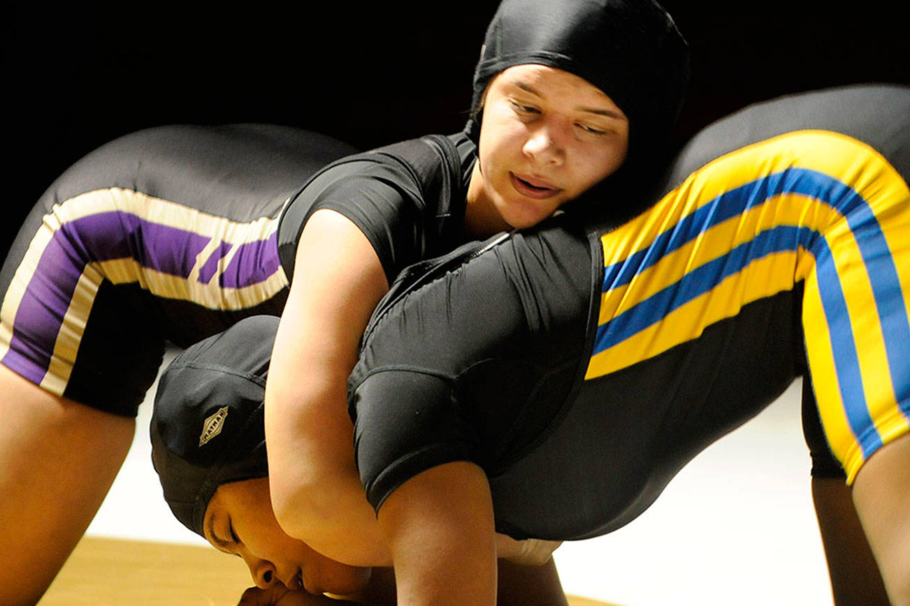 Prep wrestling: Sequim’s Pierson earns league MVP honor, Mendoza picked co-MVP