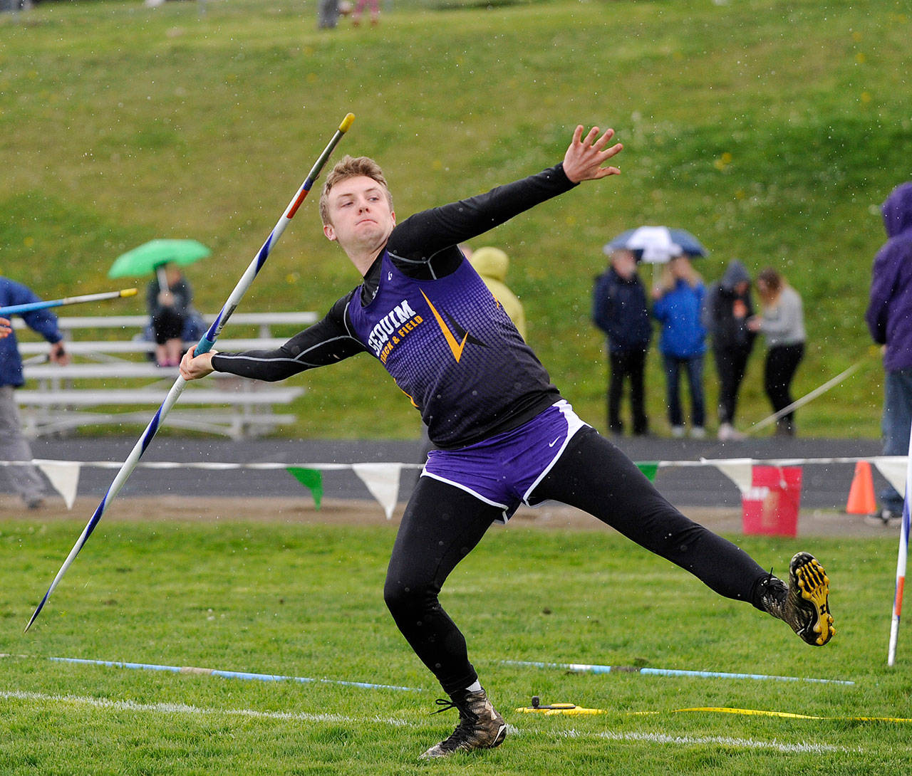 Track & Field: Sequim boys reign in the rain