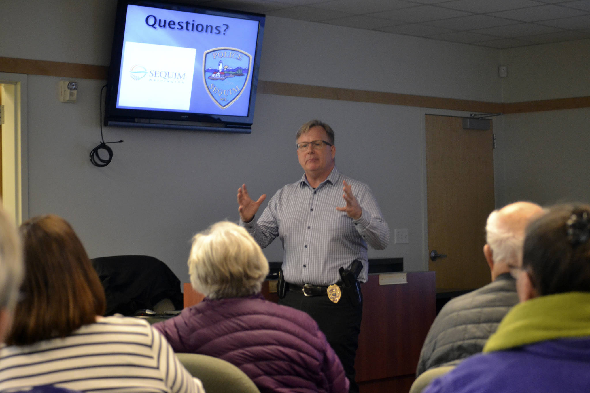 Det. Sgt. Darrell Nelson with the Sequim Police Department leads a meeting on March 29 in the Sequim Transit Center about reestablishing the Neighborhood Watch program across the city. Sequim Police stopped leading the program in 2010 due to cutbacks. Sequim Gazette photo by Matthew Nash