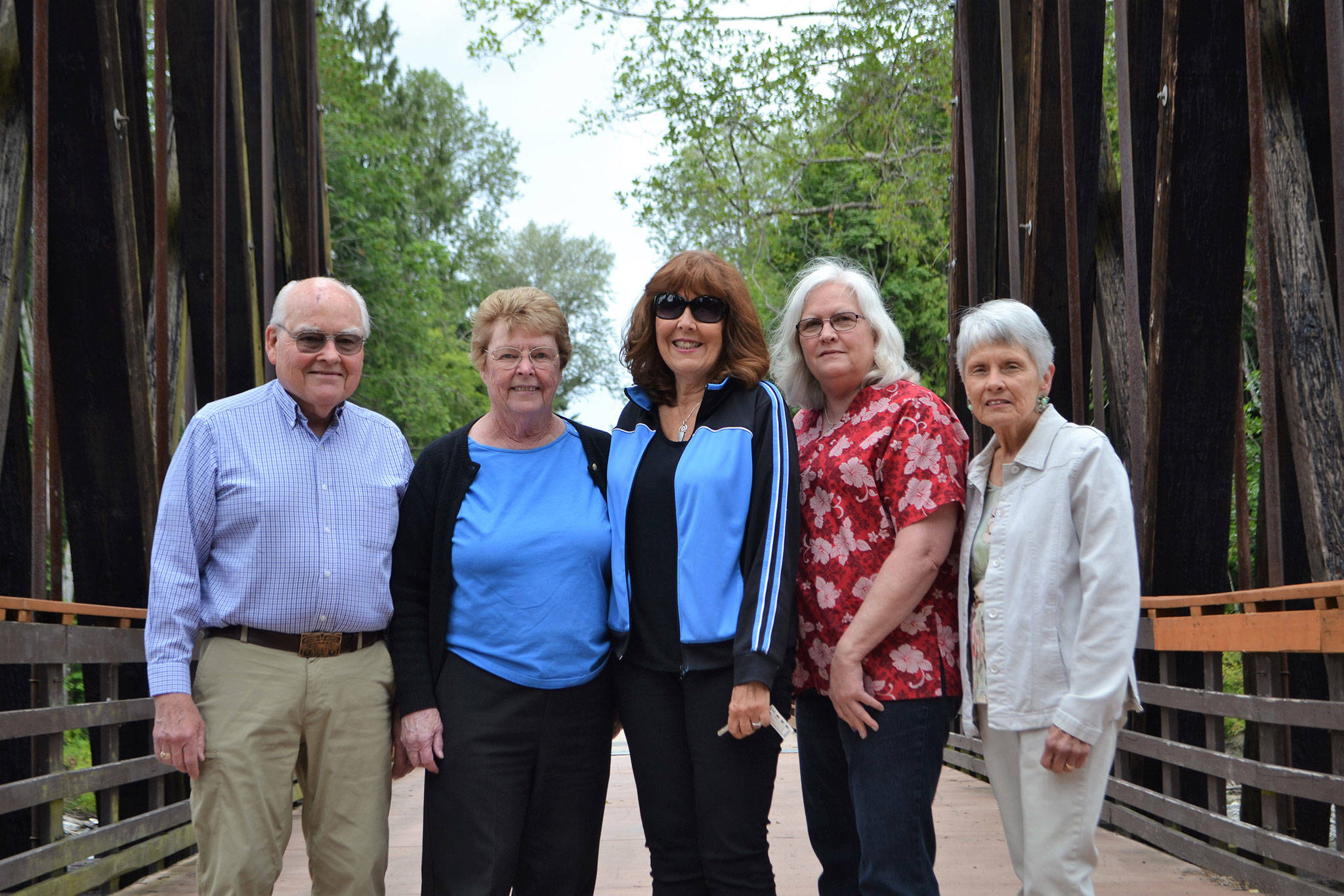 Board members of Sequim Community Aid, include, from left, Jim Davis, president; Anne Notman, vice president; Kathy Suta, vice president of fundraising; Kathy Fong, treasurer; and Linda Alexander, recording secretary. The board says financial support is about half of its regular levels to provide help to those in-need with utilities and rent. Sequim Gazette photo by Matthew Nash