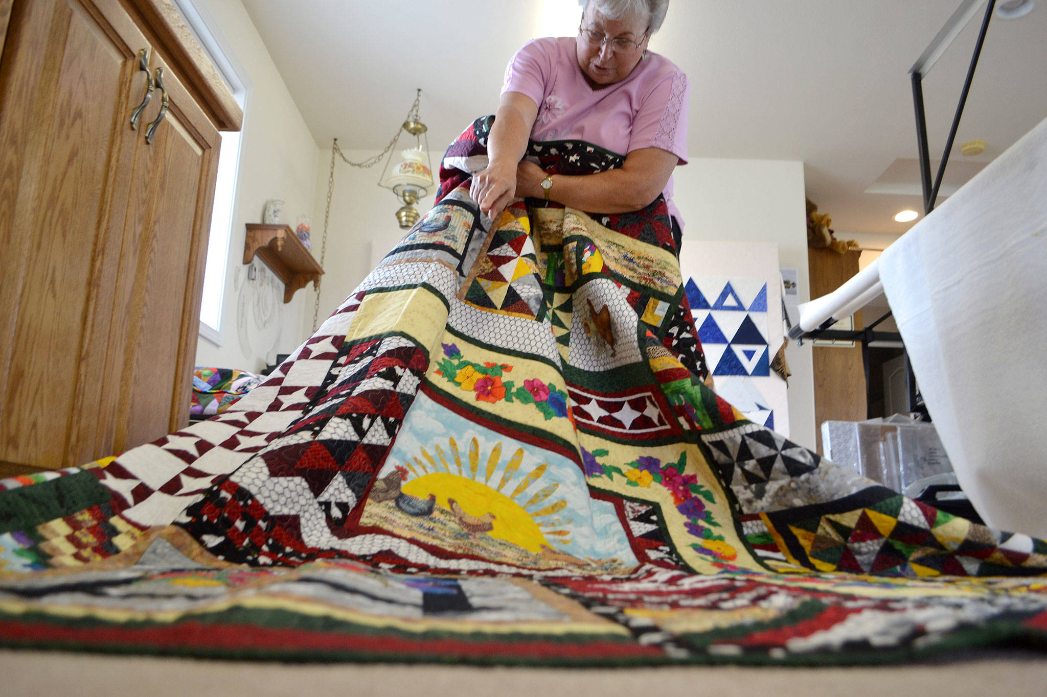 “Chicken Soup” took Murph Gerber a year to finish while living in Nebraska. She took a class at a quilt shop and received a new quilt block each month after finishing the previous one. It’ll be on display with dozens of Gerber’s quilts and hundreds of others on July 21-23 at Sequim Middle School. Sequim Gazette photos by Matthew Nash