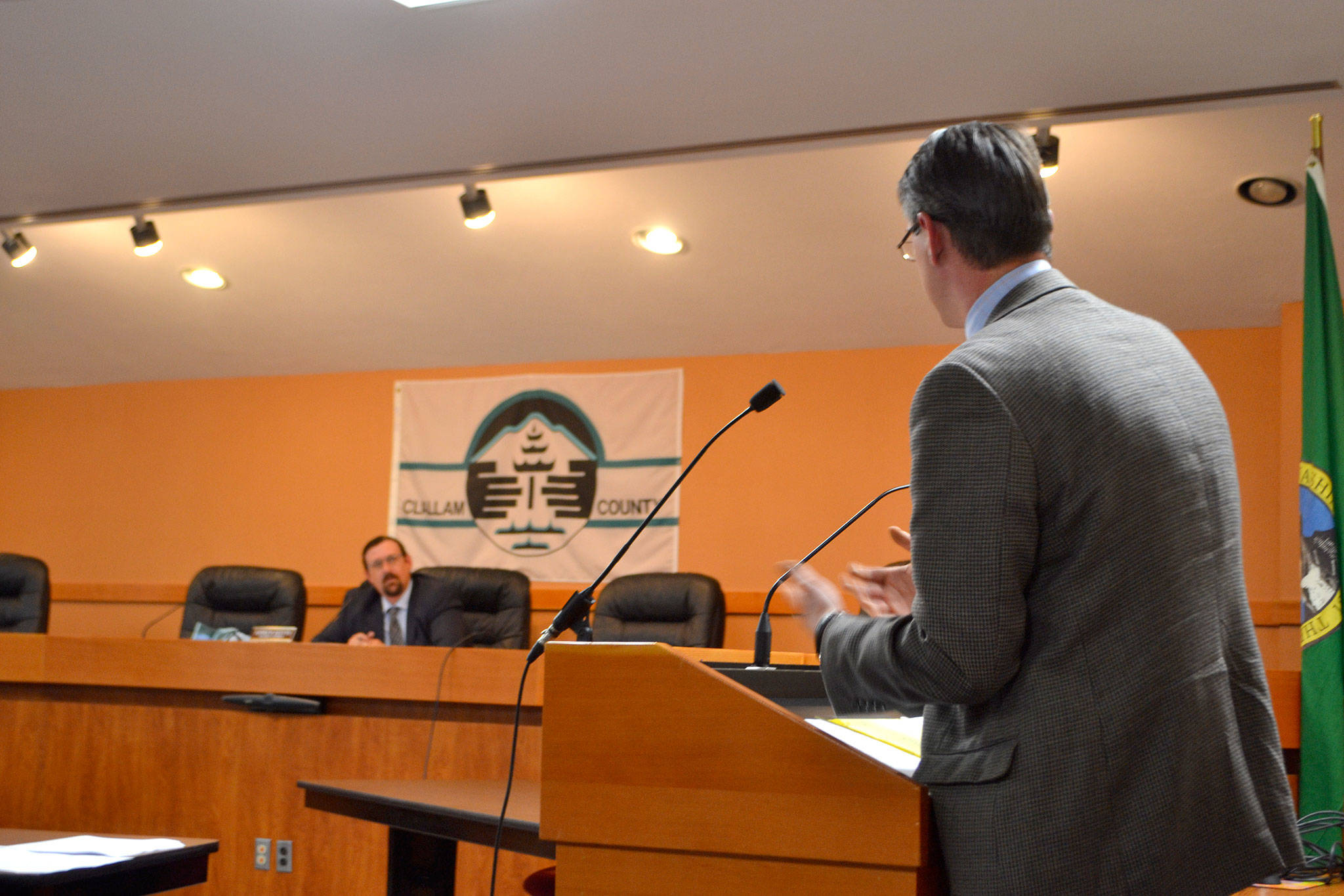 Attorney Bryan Telegin of Bricklin & Newman of Seattle, for the Concerned Atterberry Neighbors group, requests a continuation of a hearing on a proposed 73 manufactured homes in Carlsborg. Clallam County Hearing Examiner Andrew Reeves gave the public until July 21 to comment on the proposal and developer Chris Anderson July 28 to respond. He’ll make a decision by Aug. 11 on the project. Sequim Gazette photo by Matthew Nash