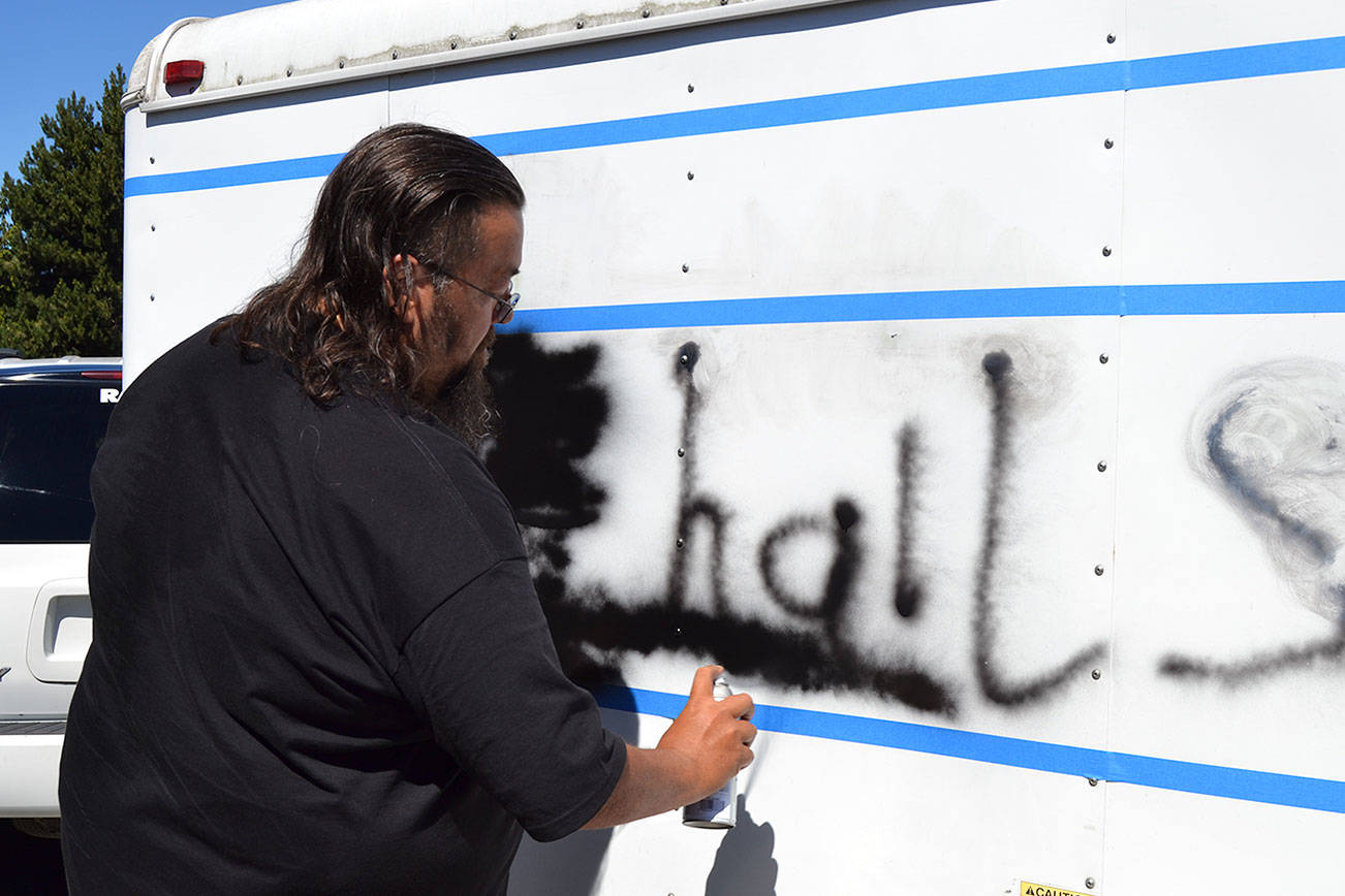 Vandals spray paint Sequim church’s door and trailer