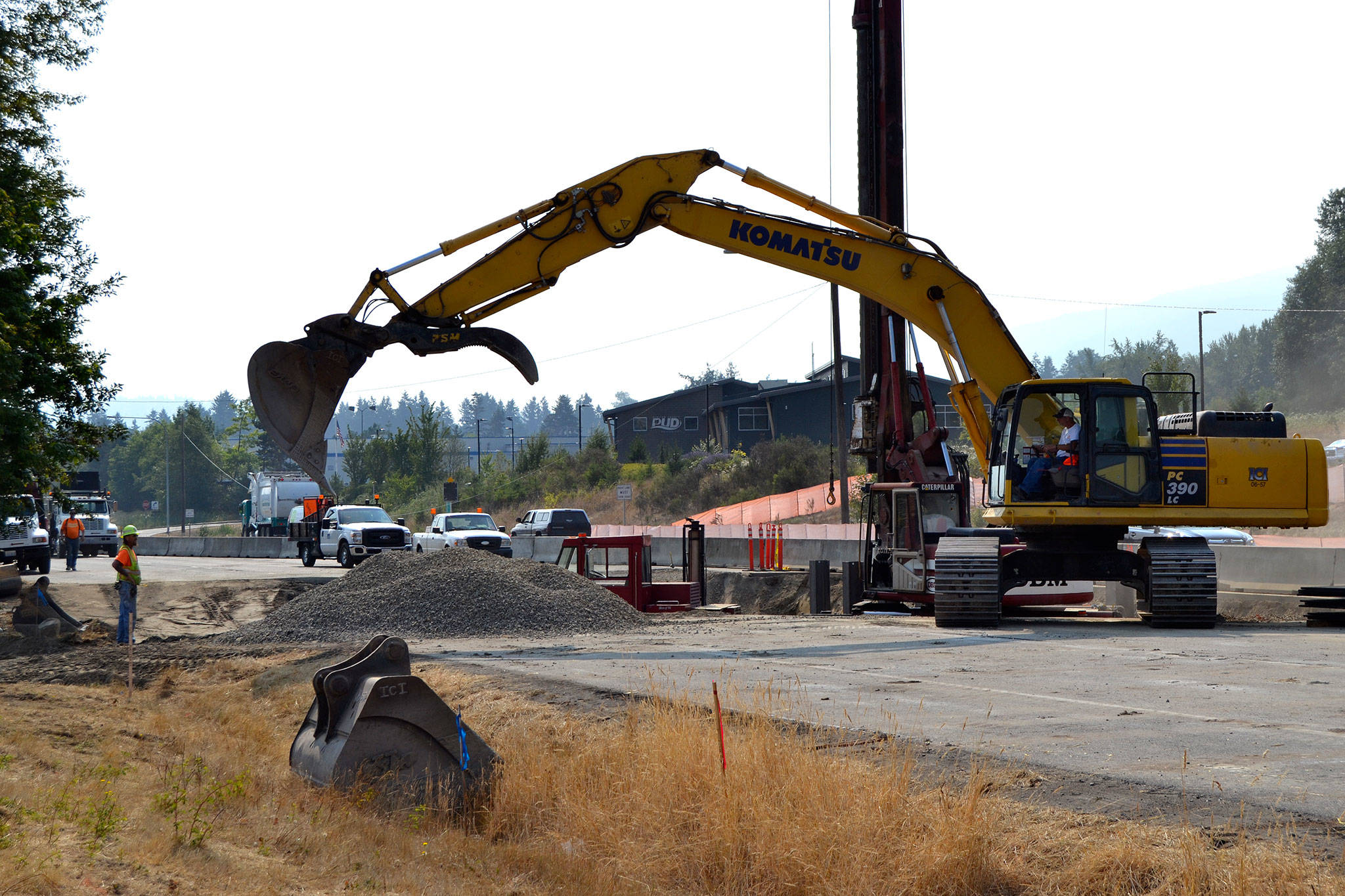 Crewmen under contract with the Department of Transportation continue work to replace a culvert with a larger one in Matriotti Creek to increase fish passage and habitat. U.S. Highway 101 will remain one lane each direction through the short stretch in Carlsborg until work is done in the fall. Sequim Gazette photos by Matthew Nash