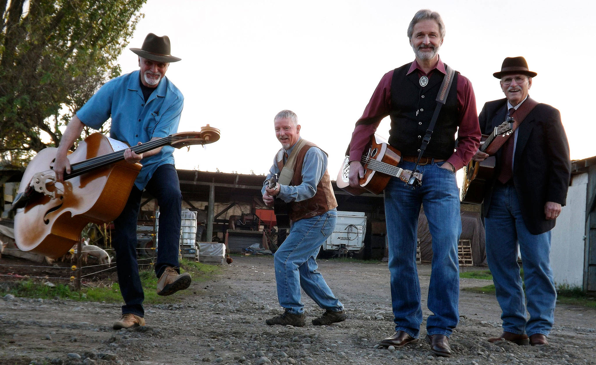 Left, John Pyles, Rick Meade, Jim Faddis and Cort Armstrong of FarmStrong prepare to celebrate the release of the band’s third album “Don’t Go Down That Road” on Saturday, Aug. 26, at the Dungeness Schoolhouse in Sequim. Submitted photo