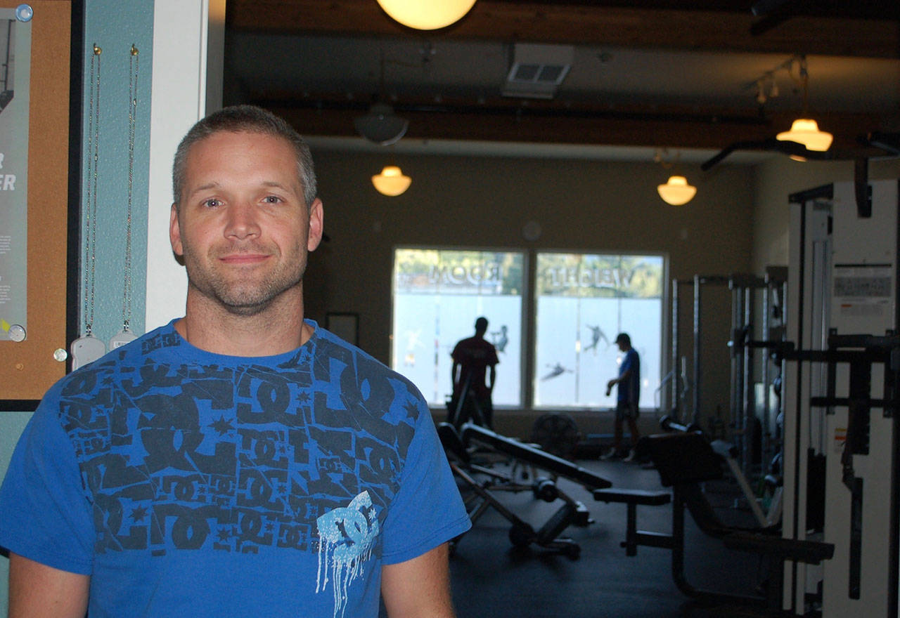 Kevin Pedrey, co-owner of Sequim Gym, stands in front of one of the gym facilities that will be closing with the rest of the business as of Sept. 1. Sequim Gazette photo by Erin Hawkins