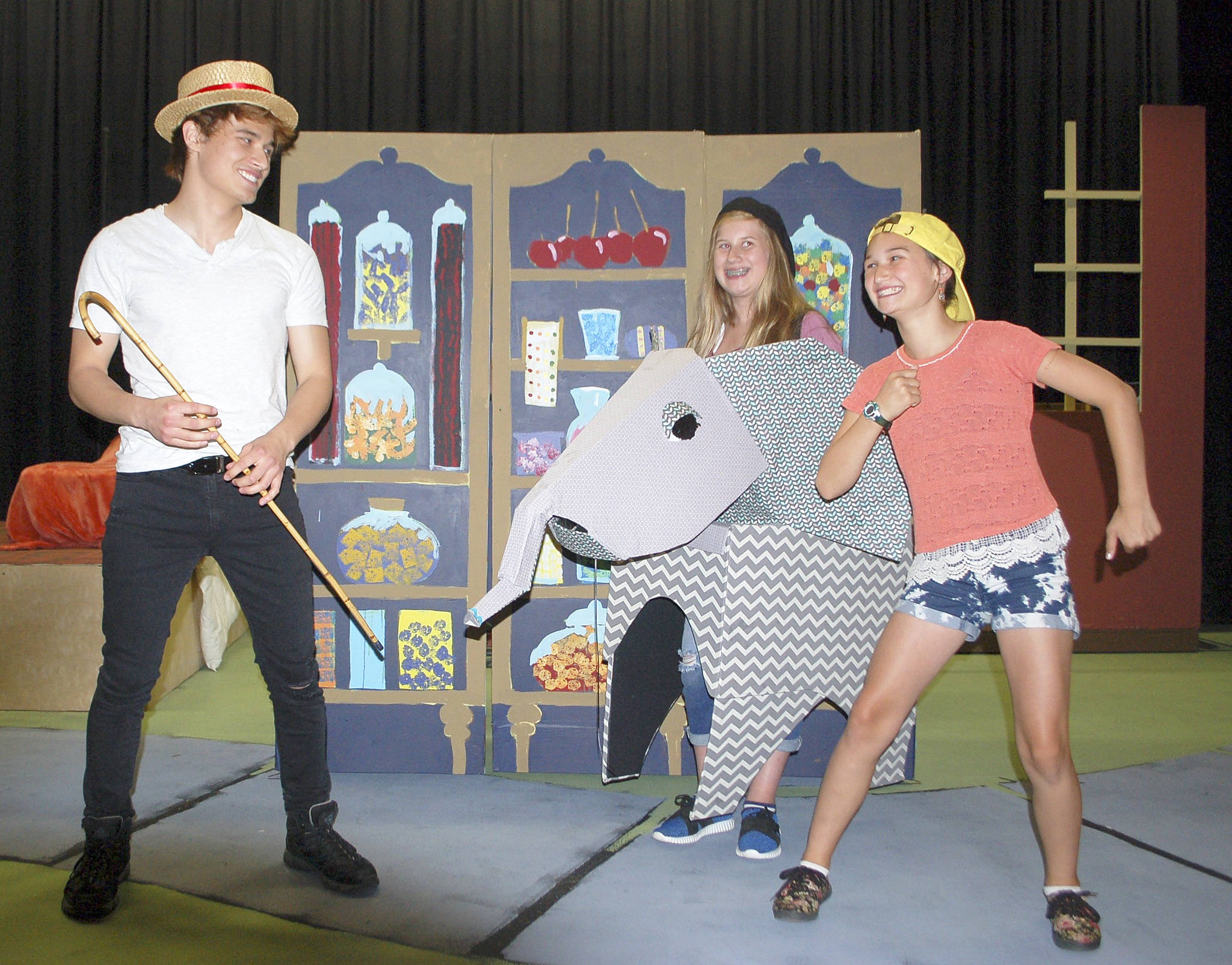 From left, Ryan Chen, Gabby Montana and Zoe Cook act out a scene from the upcoming musical “Strictly No Elephants” playing at Olympic Theatre Arts from Sept. 1-10. Sequim Gazette photos by Erin Hawkins