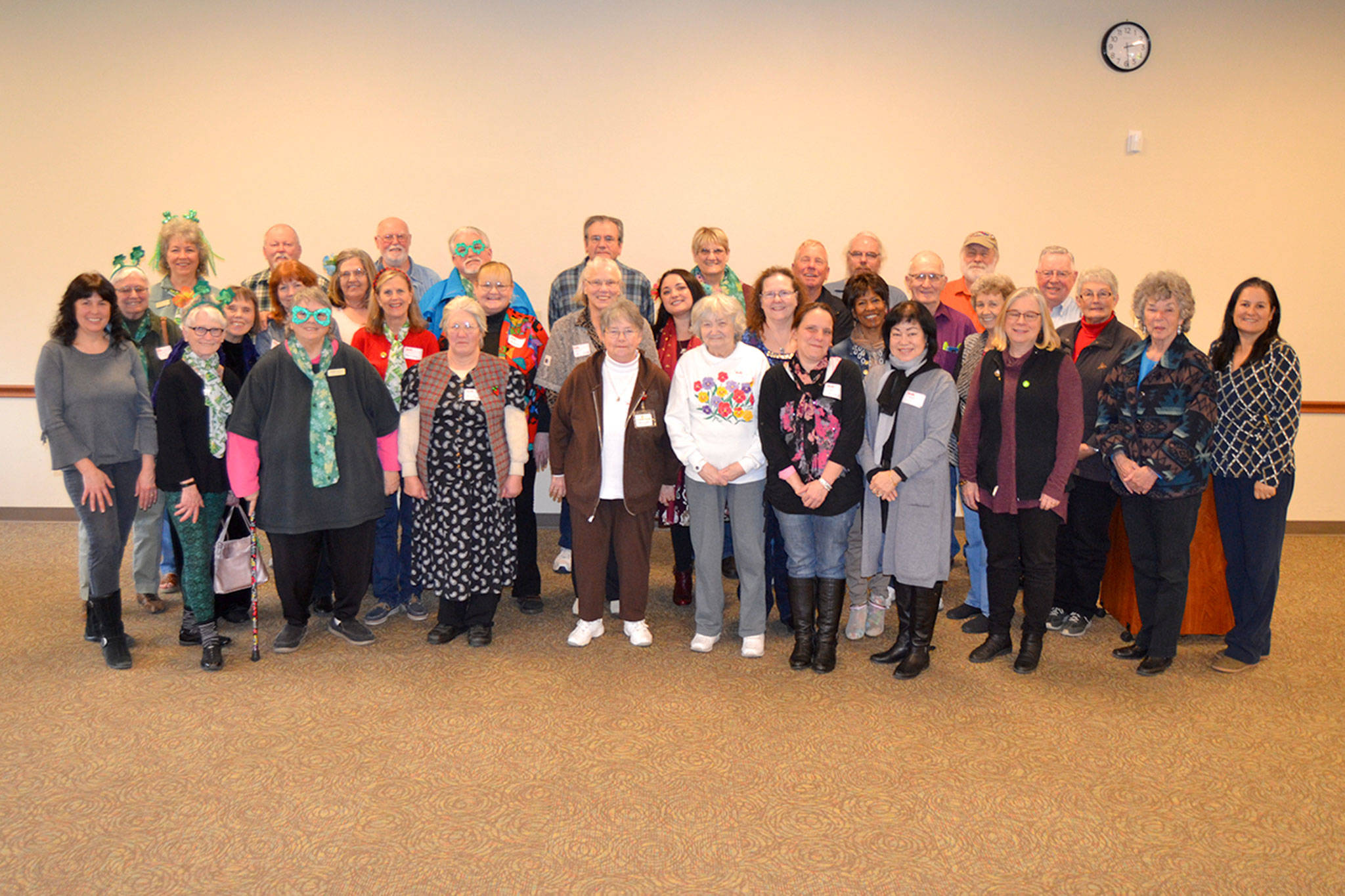 Volunteers with the Retired and Senior Volunteer Program (RSVP) gather for a photo on March 8 at a special luncheon honoring their efforts. Between Clallam and Jefferson counties, more than 200 volunteers help deliver food to homebound seniors, tutors in schools and much more through the program for those 52 and up. Sequim Gazette photos by Matthew Nash