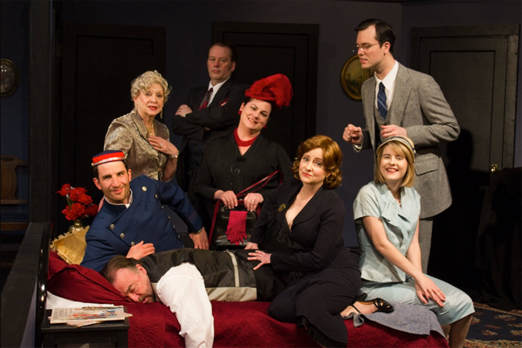 The cast of “Lend Me a Tenor” features front left, Ron Graham (sleeping), Josh McLean, Angela Poynter, Alison Cobb, and back left, Kathy Balducci, Richard Stephens, Jennifer Saul and Randy Powell. Submitted photo