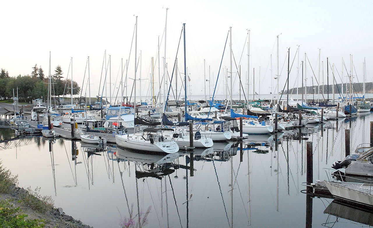 Boats sit on placid water last week at John Wayne Marina in Sequim. Photo by Keith Thorpe/Peninsula Daily News