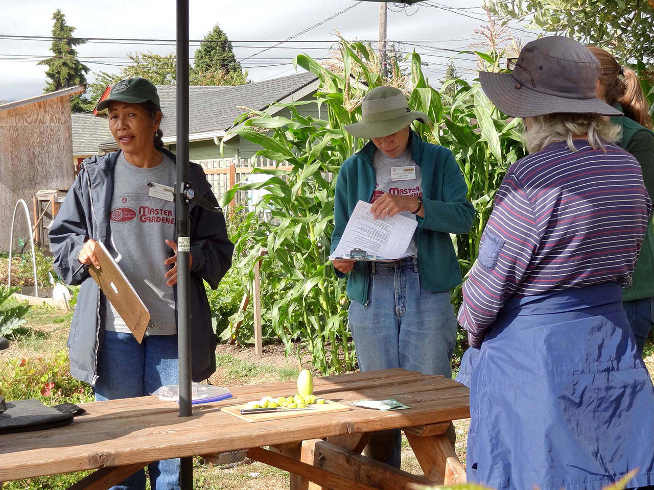 Community walk examines garden prep for winter months