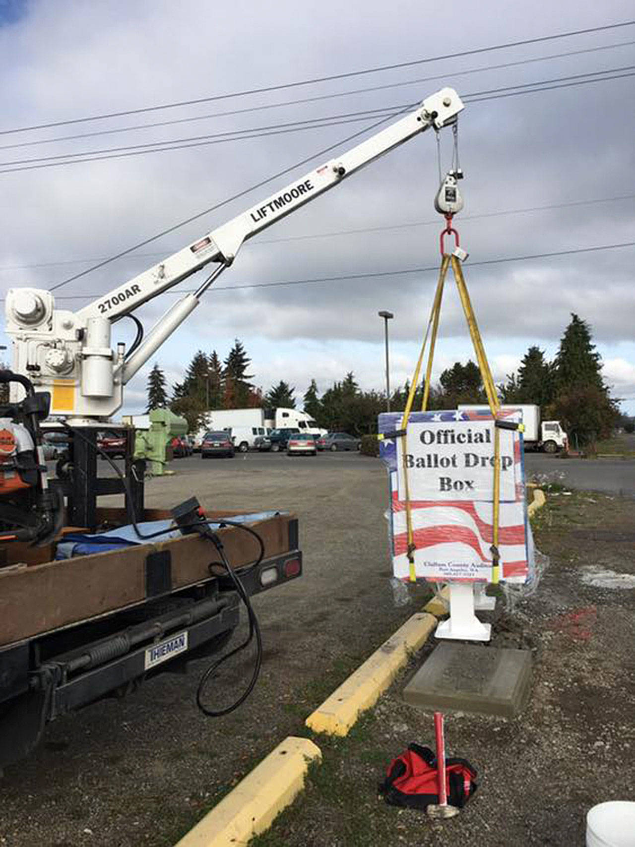 Clallam County crews install a new ballot box in Carlsborg by Sunny Farms. Photo courtesy of Jim Steeby