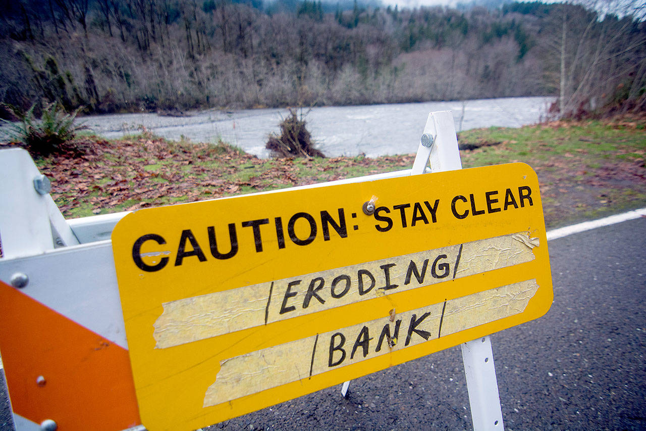 Heavy rains on Monday and Tuesday caused river bank erosion on the Elwha River, forcing the closure of the Madison Falls parking area and the valley at the Olympic National Park boundary. (Jesse Major/Peninsula Daily News)