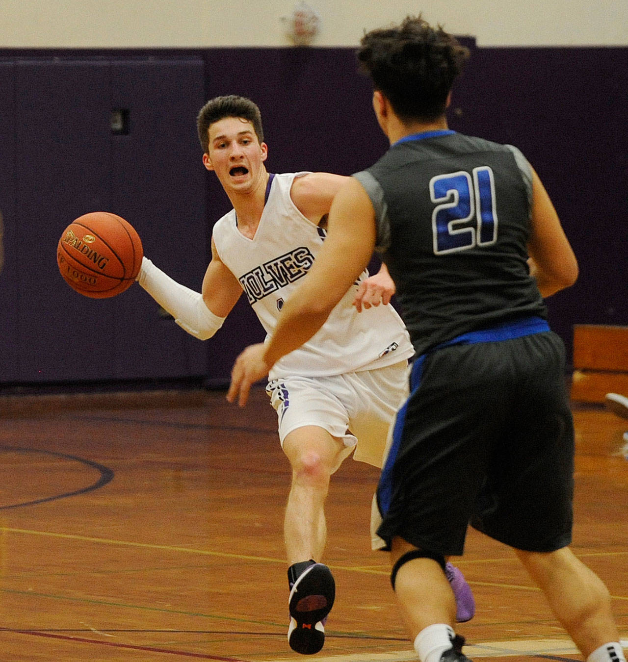 Boys basketball: Sequim surges, slips in loss to Roughriders