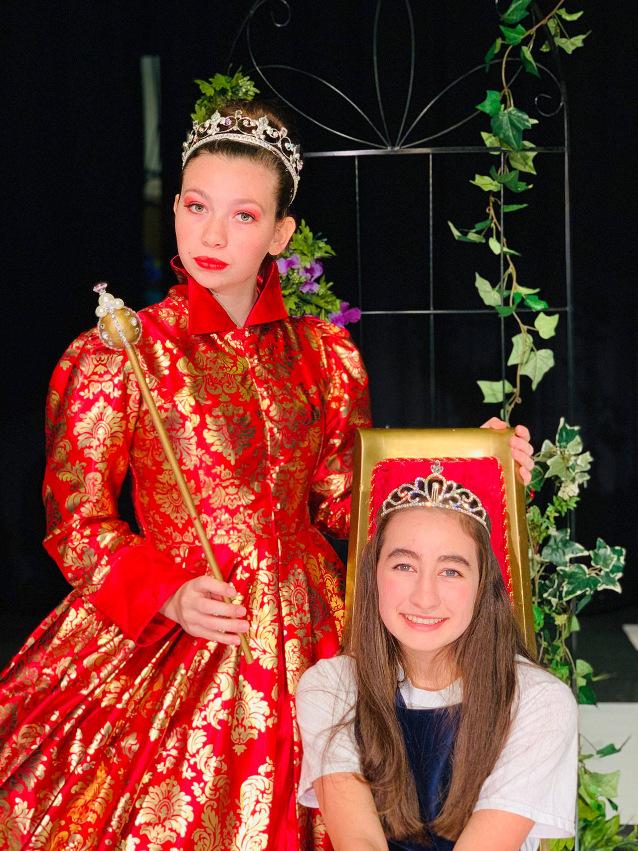 As the Queen and Alice, Maggie van Dyken and Kariya Johnson star in the upcoming “Through the Looking Glass” that runs one week at Sequim High School Feb 27-March 2 as a benefit for the Sequim High School Senior Class. Submitted photo