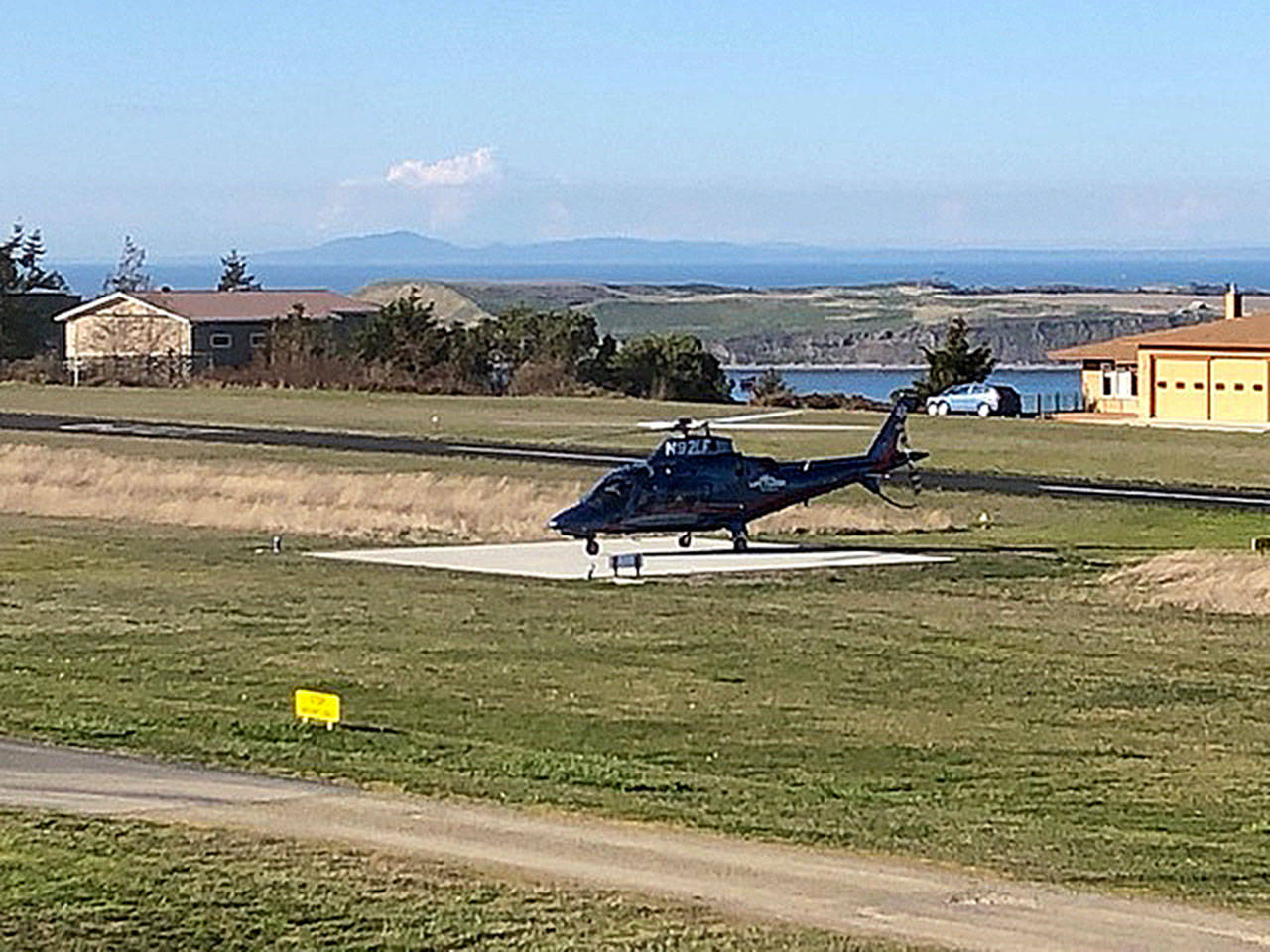 Contributor Mike Connors snaps a photo of a helicopter readying a transport for a Diamond Point resident who fell from a ladder. Officials with Harborview Medical Center said the man died a day later. Submitted photo