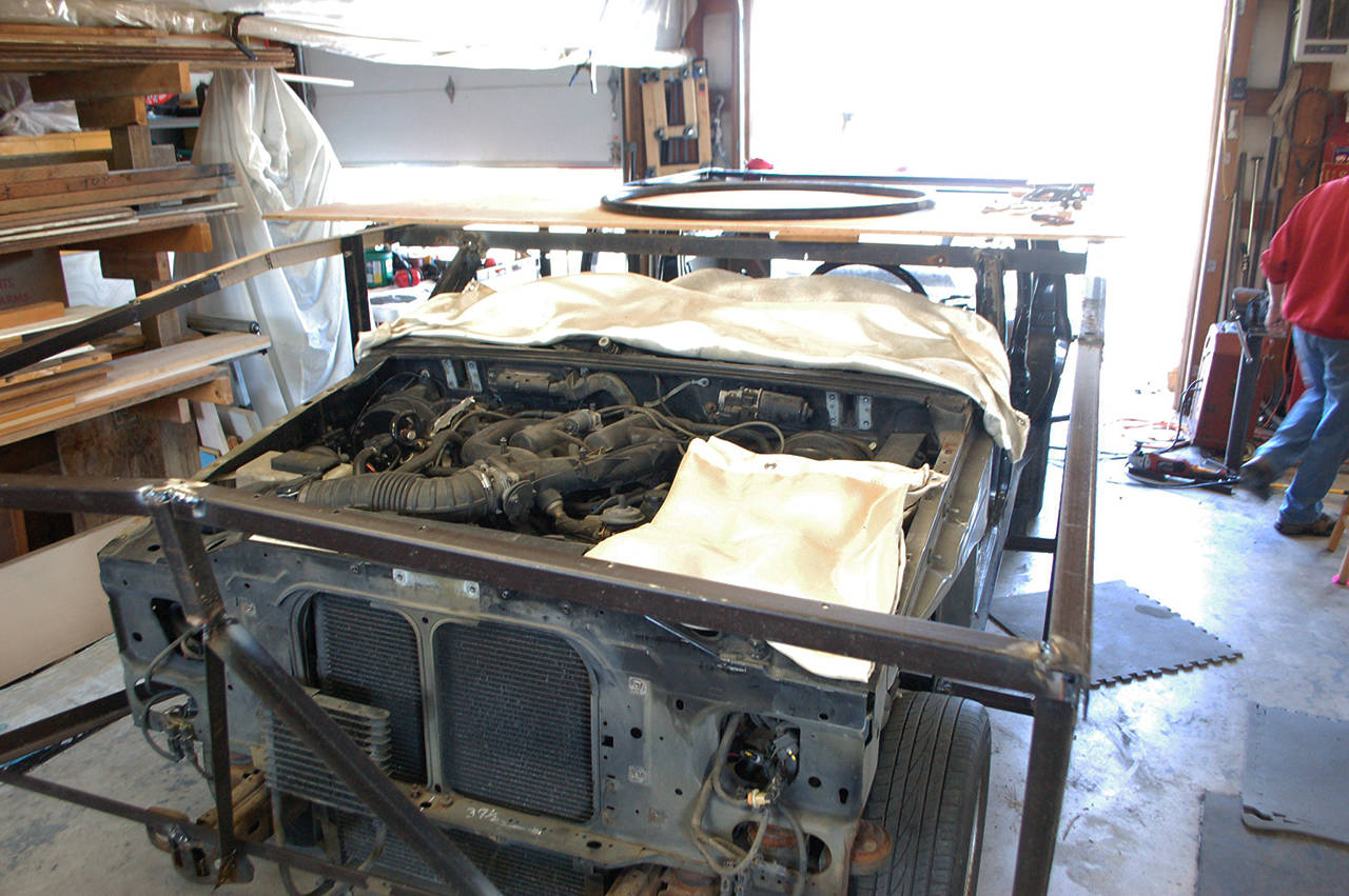 The cut-down SUV with the steel framing attached that will form the Mount Olympus detachment’s new LVTH-6A1 replica parade float. Sequim Gazette photo by Conor Dowley